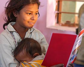 Girl-reading-Good-News-Storybook